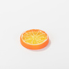 Artificial lemon slice with orange peel
