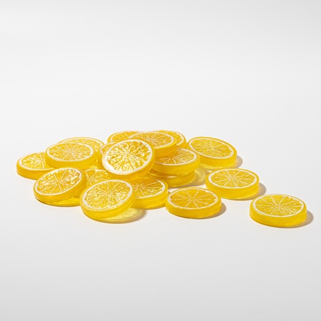 Artificial lemon slice with yellow peel