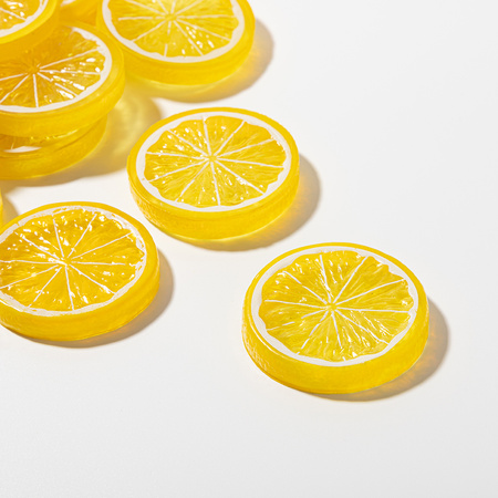 Artificial lemon slice with yellow peel